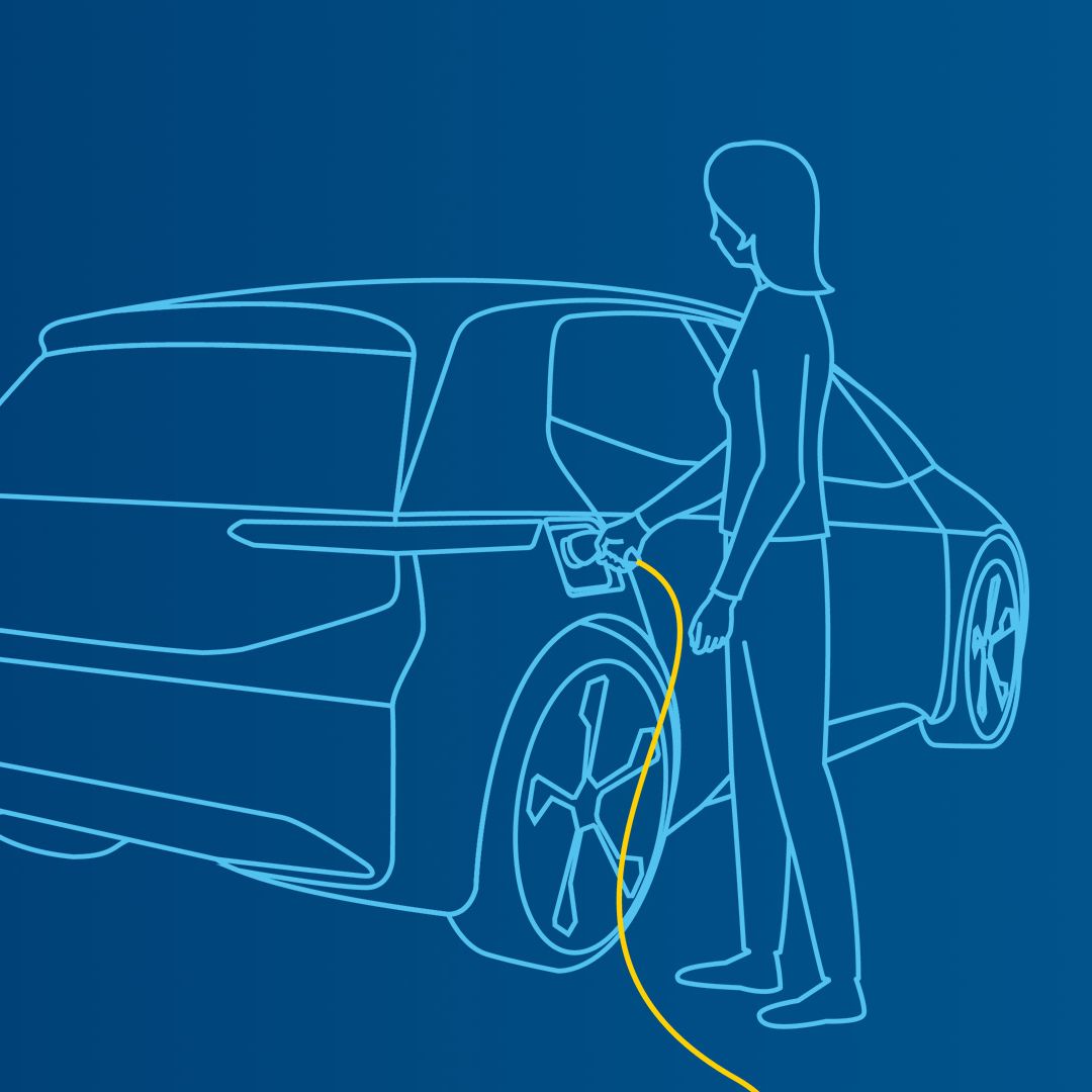 Frau lädt ihr Elektrofahrzeug