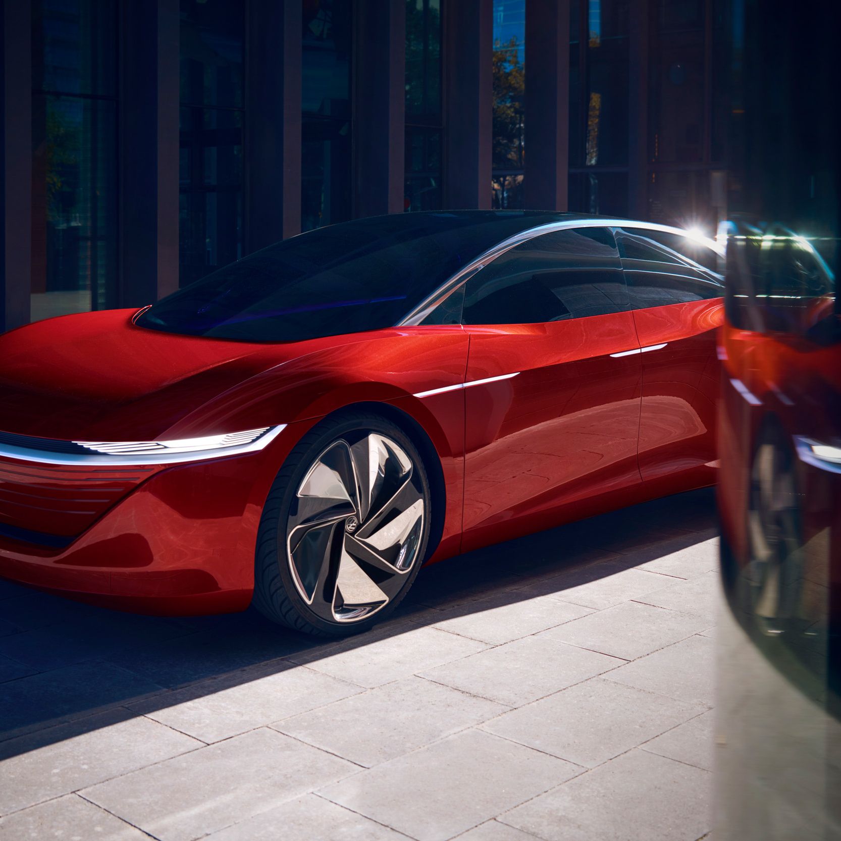VW ID. Vizzion Elektroauto rot Vorderansicht Seitenansicht